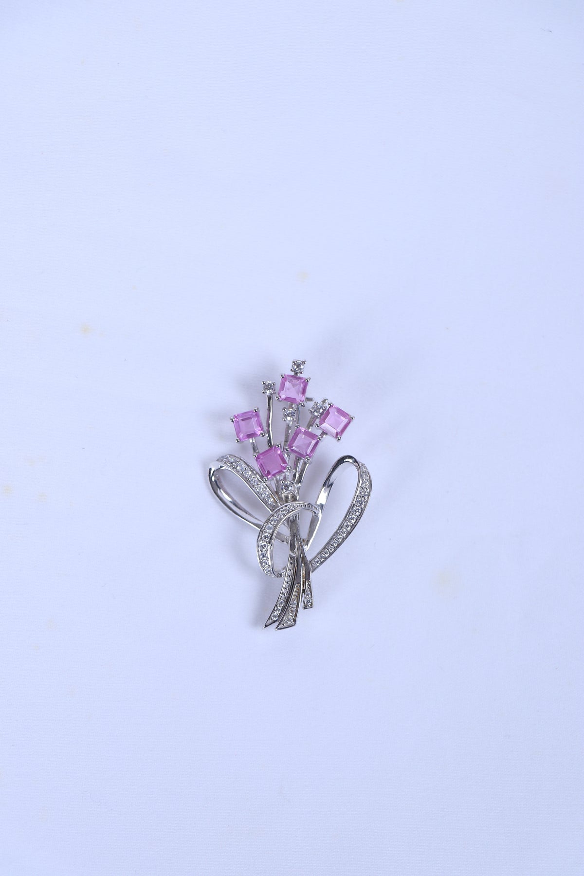 Silver-tone heart ribbon brooch with pink square crystal accents