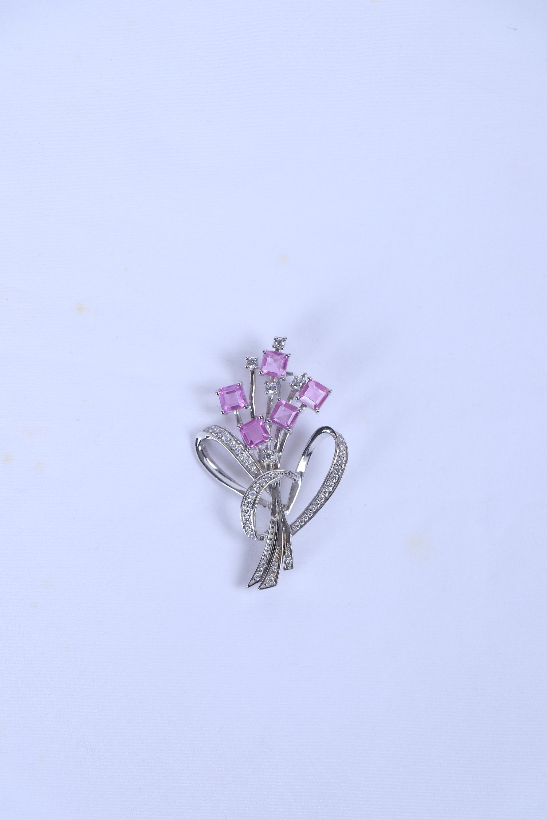 Silver-tone heart ribbon brooch with pink square crystal accents