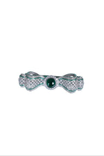Sterling silver brooch with green center stone and pavé detailing