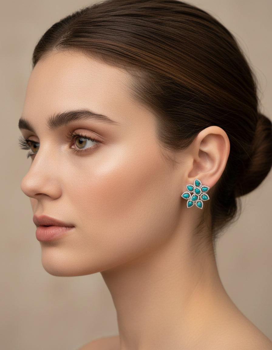 Woman wearing turquoise floral Silver earrings